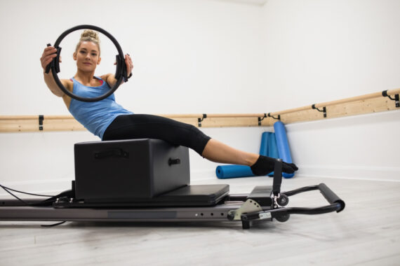 woman-exercising-with-pilates-ring