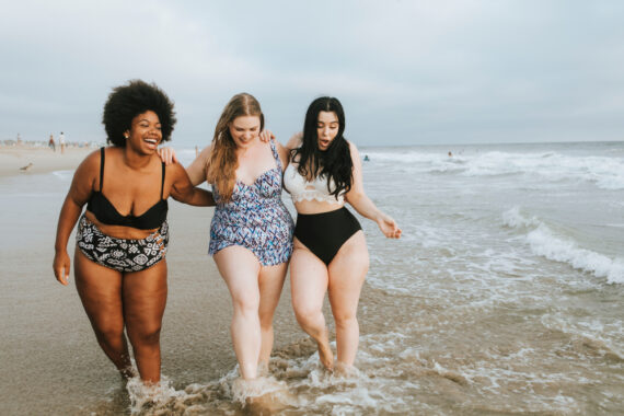 cheerful-plus-size-women-at-beach